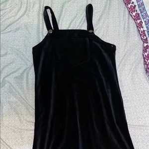 black corduroy dress with pocket in front